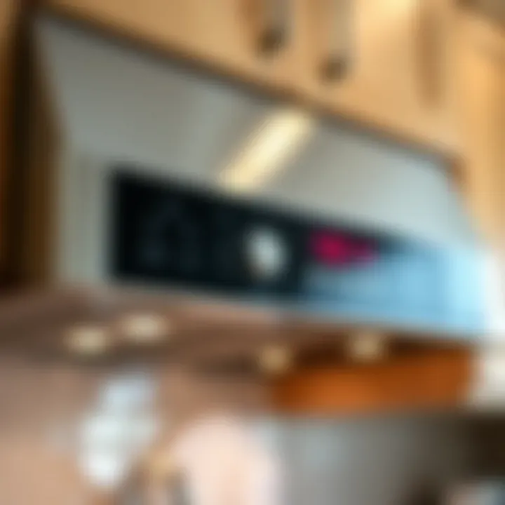 Close-up of the control panel on an under cabinet range hood emphasizing user-friendly features