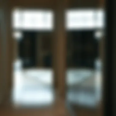 Ebern Designs mirrors reflecting intricate details in a hallway