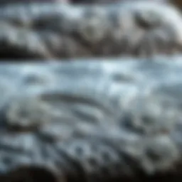 A beautifully arranged gray floral quilt showcasing intricate patterns