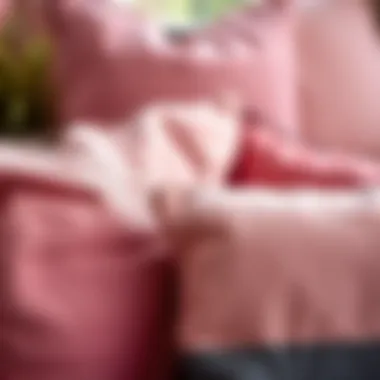 Close-up of textures and fabrics of mauve pink throw pillows