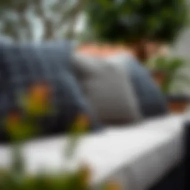 Textured Charcoal Grey Pillows on a Patio Close-up of textured charcoal grey outdoor pillows on a patio